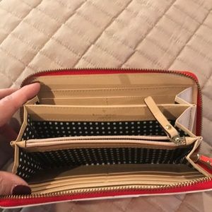 Kate Spade neon orange wallet